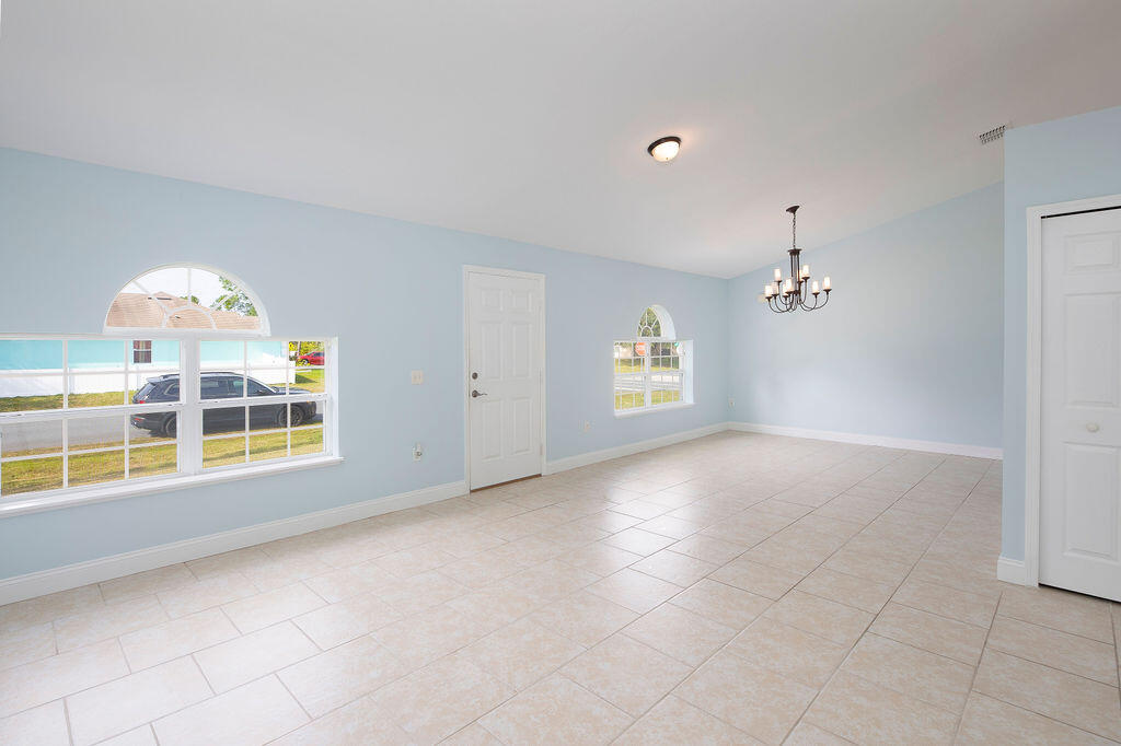 1815 Dragon Road Southeast Palm Bay, FL 32909 - Photo 11 of 41 a view of an empty room with a window