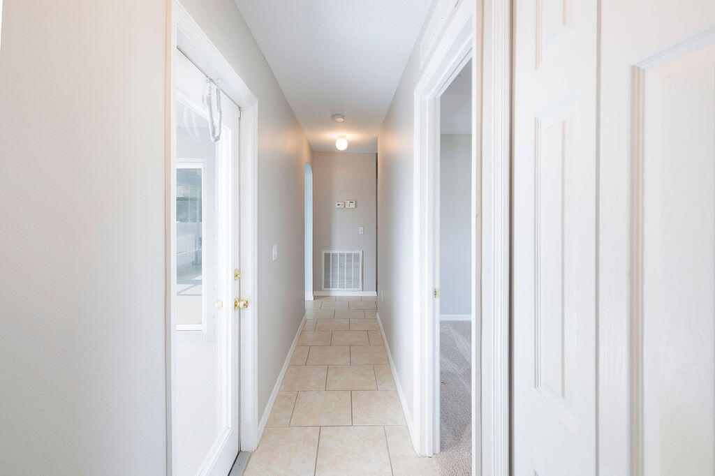 1815 Dragon Road Southeast Palm Bay, FL 32909 - Photo 31 of 41 a view of a room with a hallway