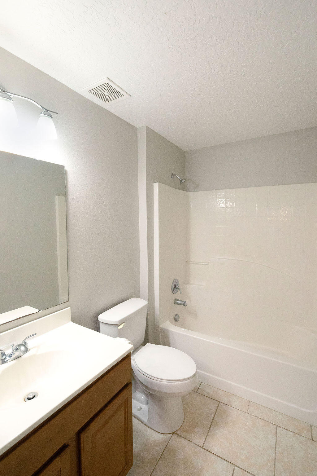 1815 Dragon Road Southeast Palm Bay, FL 32909 - Photo 34 of 41 a bathroom with a sink a toilet and shower