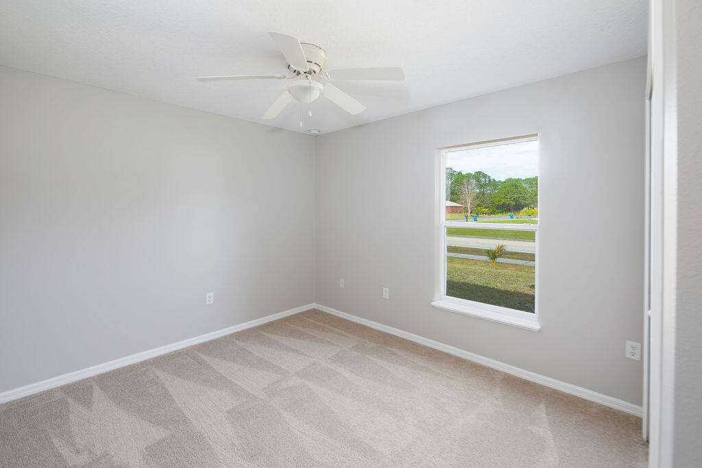1815 Dragon Road Southeast Palm Bay, FL 32909 - Photo 35 of 41 an empty room with a window