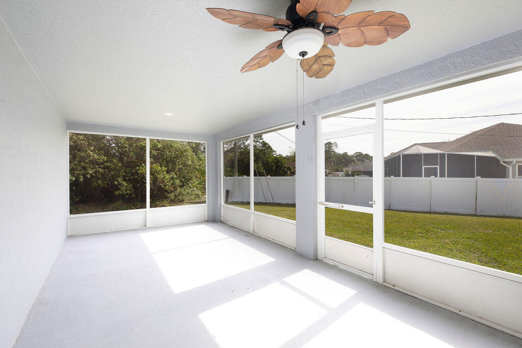 1815 Dragon Road Southeast Palm Bay, FL 32909 - Photo 37 of 41 a view of an empty room with windows