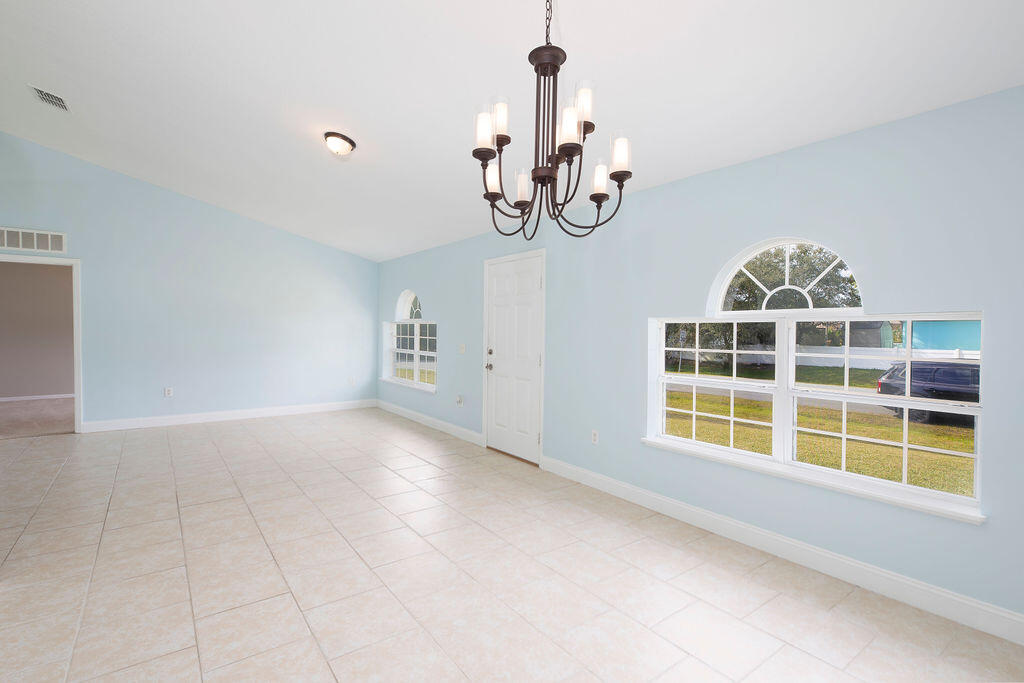 1815 Dragon Road Southeast Palm Bay, FL 32909 - Photo 10 of 41 a view of an empty room with a window