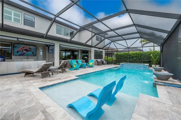 a view of a swimming pool with a patio