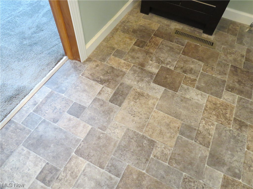 10130 Lee Road Minerva, OH 44657 - Photo 18 of 35 flooring in bathroom.