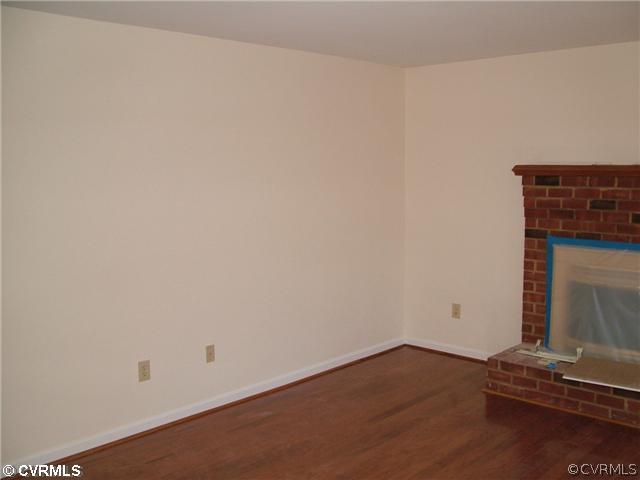 4563 Paynes Mill Road Bumpass, VA 23024 - Photo 4 of 12 a view of an empty room with wooden floor
