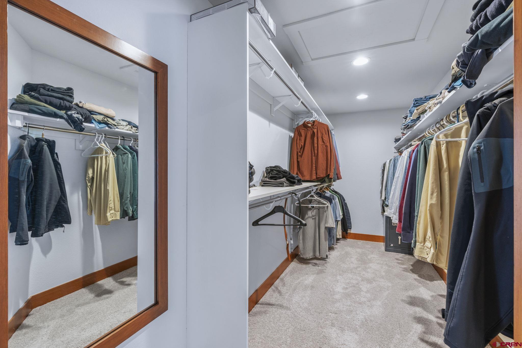 24 Songbird Lane Durango, CO 81301 - Photo 31 of 45 a view of walk in closet with clothes and shoes