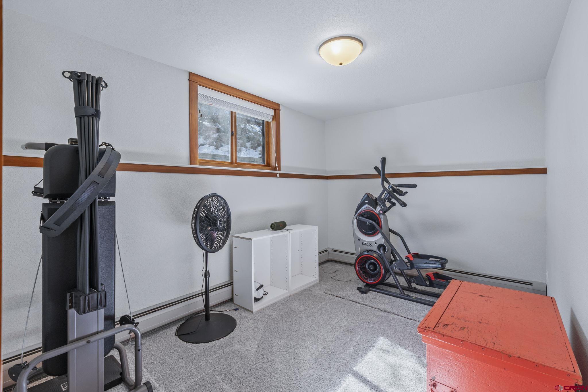 24 Songbird Lane Durango, CO 81301 - Photo 42 of 45 a view of a room with gym equipment