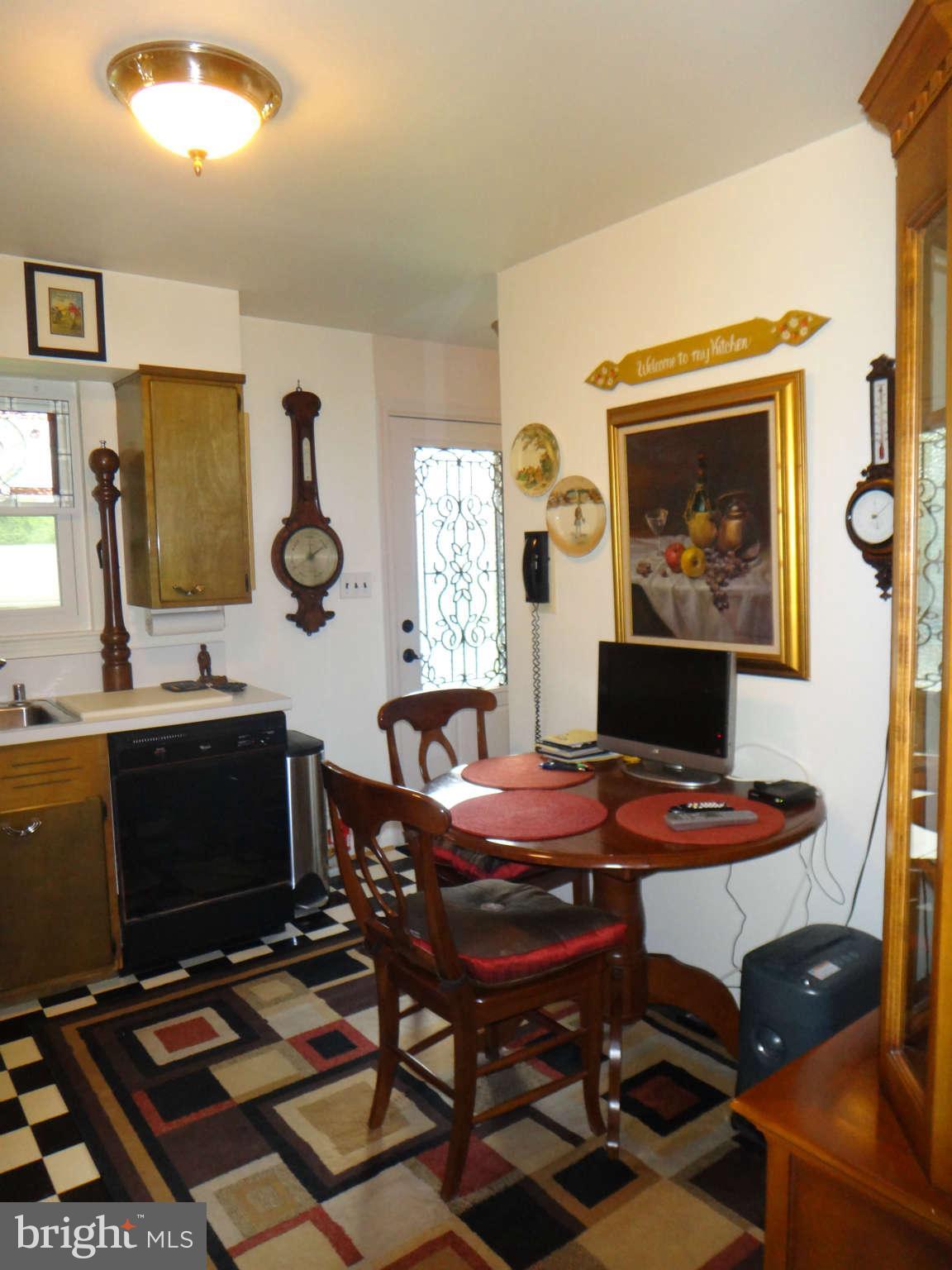 10128 Riggs Road Adelphi, MD 20783 - Photo 11 of 30 a workspace with furniture and window