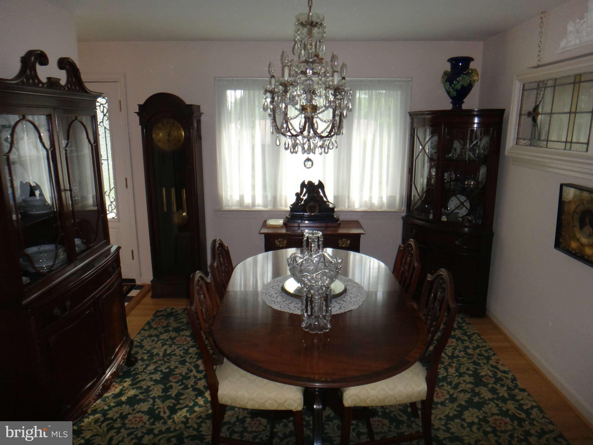10128 Riggs Road Adelphi, MD 20783 - Photo 14 of 30 a view of a dining room with furniture