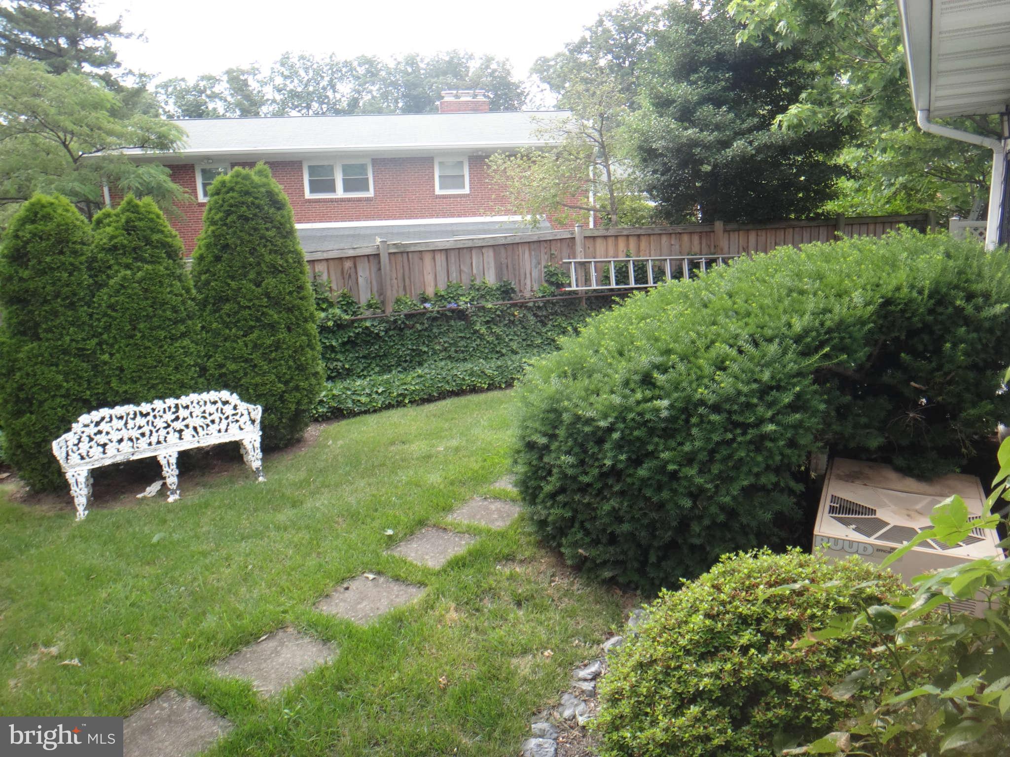 10128 Riggs Road Adelphi, MD 20783 - Photo 29 of 30 a garden view with a seating space