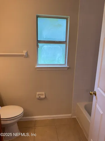 a bathroom with a sink vanity and a mirror
