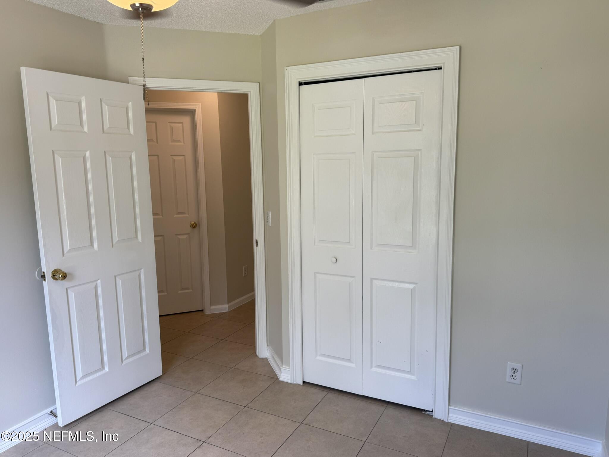 84042 St James Court Yulee, FL 32097 - Photo 29 of 44 a view of a hallway with closet area