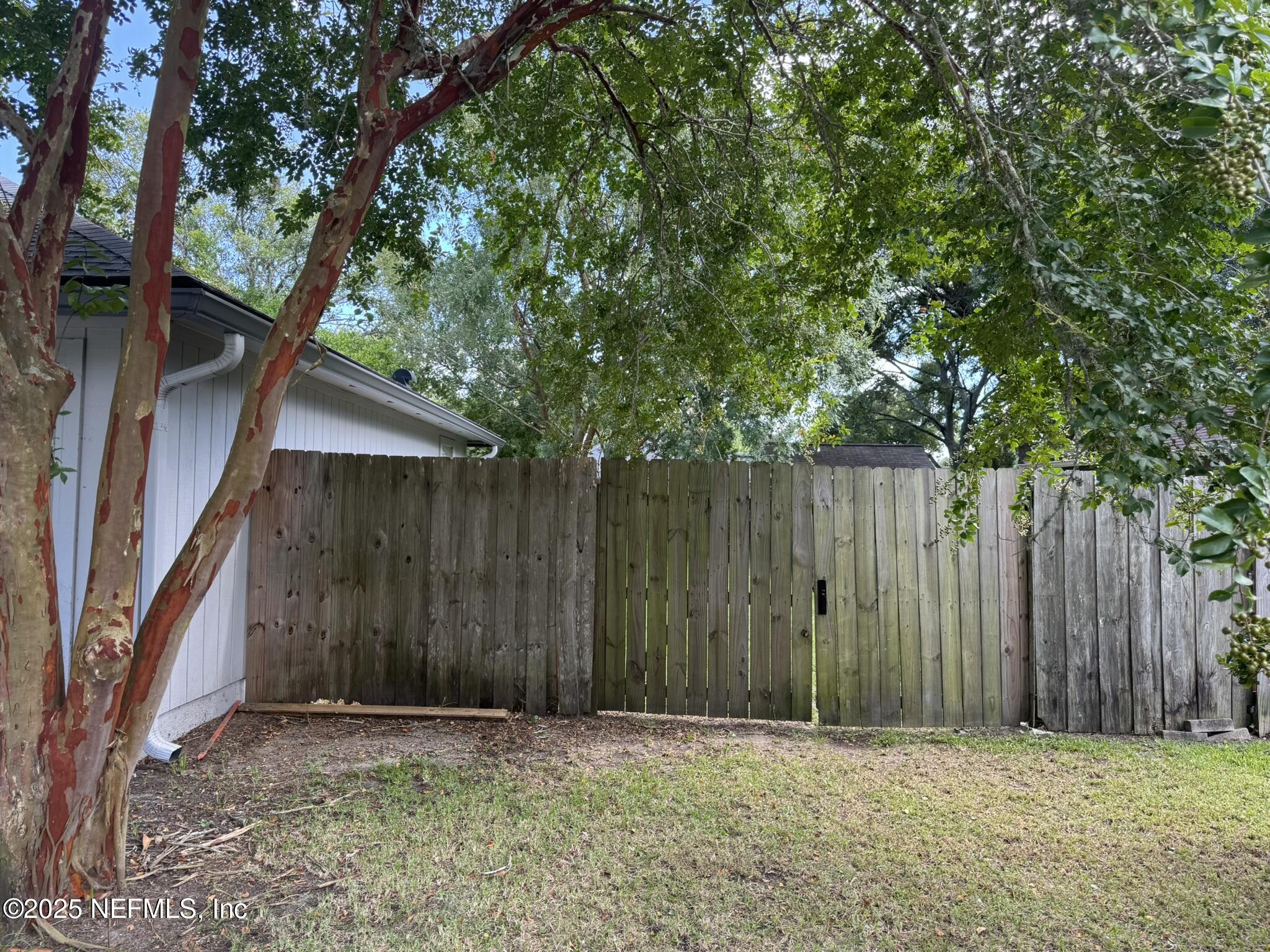 84042 St James Court Yulee, FL 32097 - Photo 3 of 44 a view of wooden fence