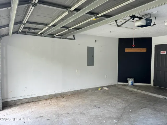 a storage room with washer and dryer