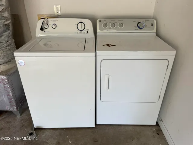 a front view of house with a yard and trees