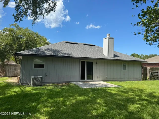 a house view with a garden space