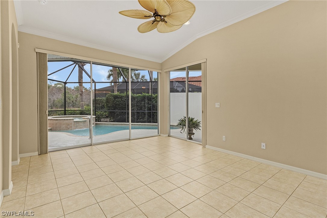 10321 Cape Roman Road, Unit 102 Estero, FL 34135 - Photo 11 of 33 a view of an empty room and window