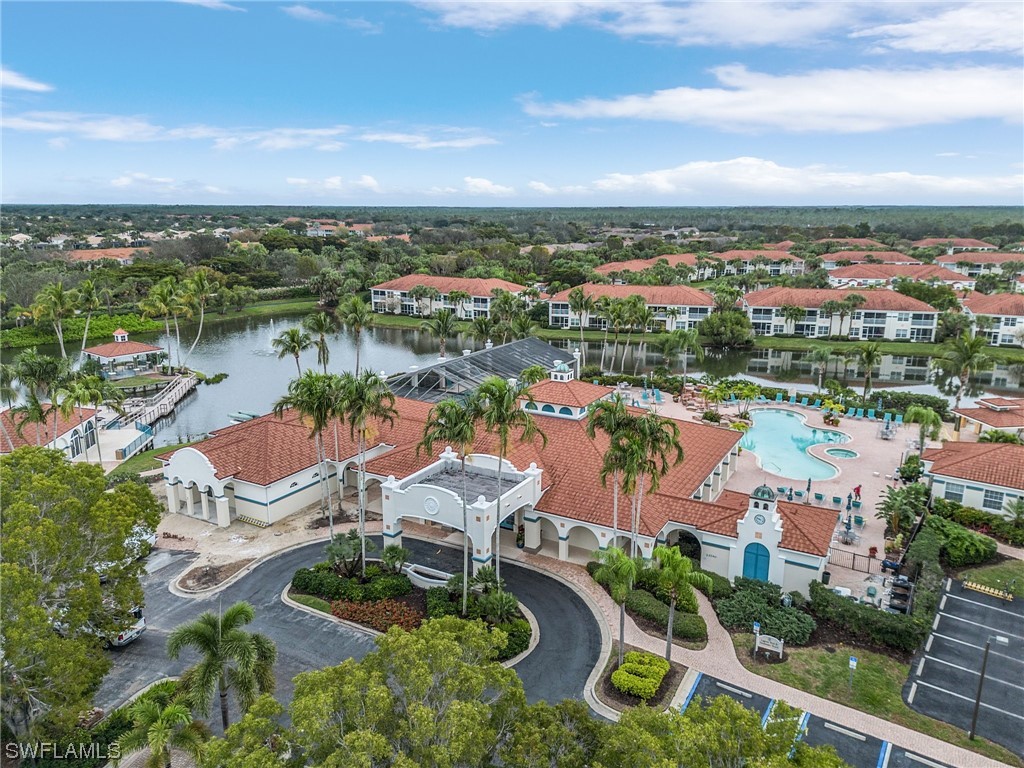 10321 Cape Roman Road, Unit 102 Estero, FL 34135 - Photo 28 of 33 an aerial view of a city
