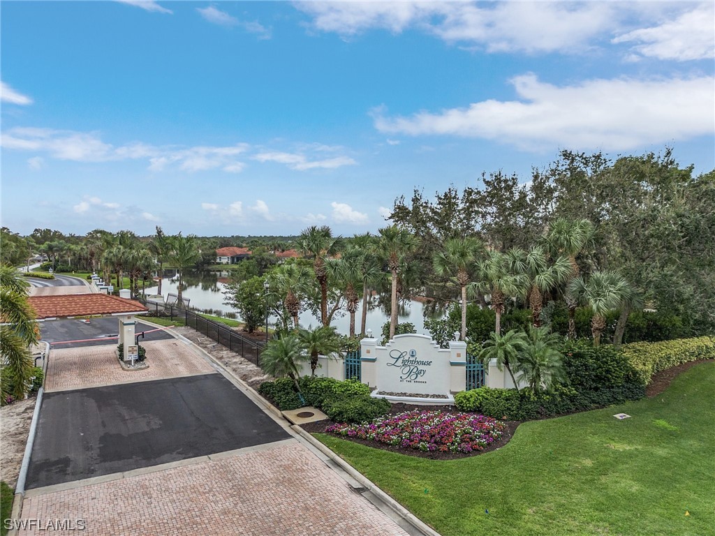 10321 Cape Roman Road, Unit 102 Estero, FL 34135 - Photo 31 of 33 a view of a garden