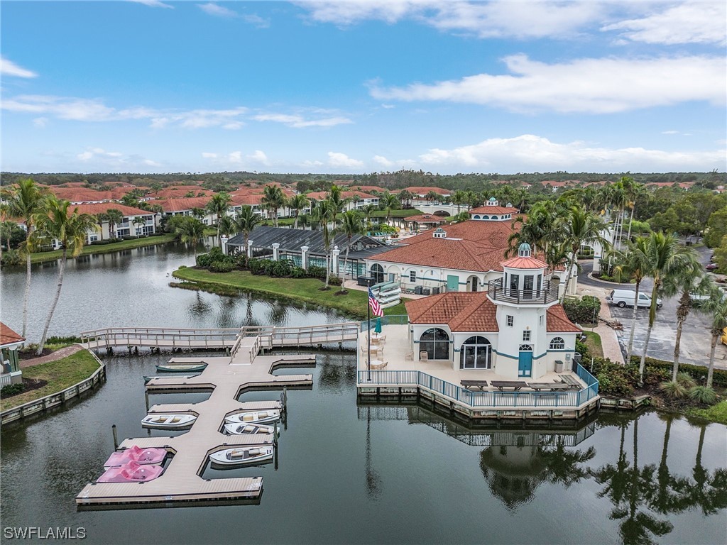 10321 Cape Roman Road, Unit 102 Estero, FL 34135 - Photo 32 of 33 a view of a lake with a city