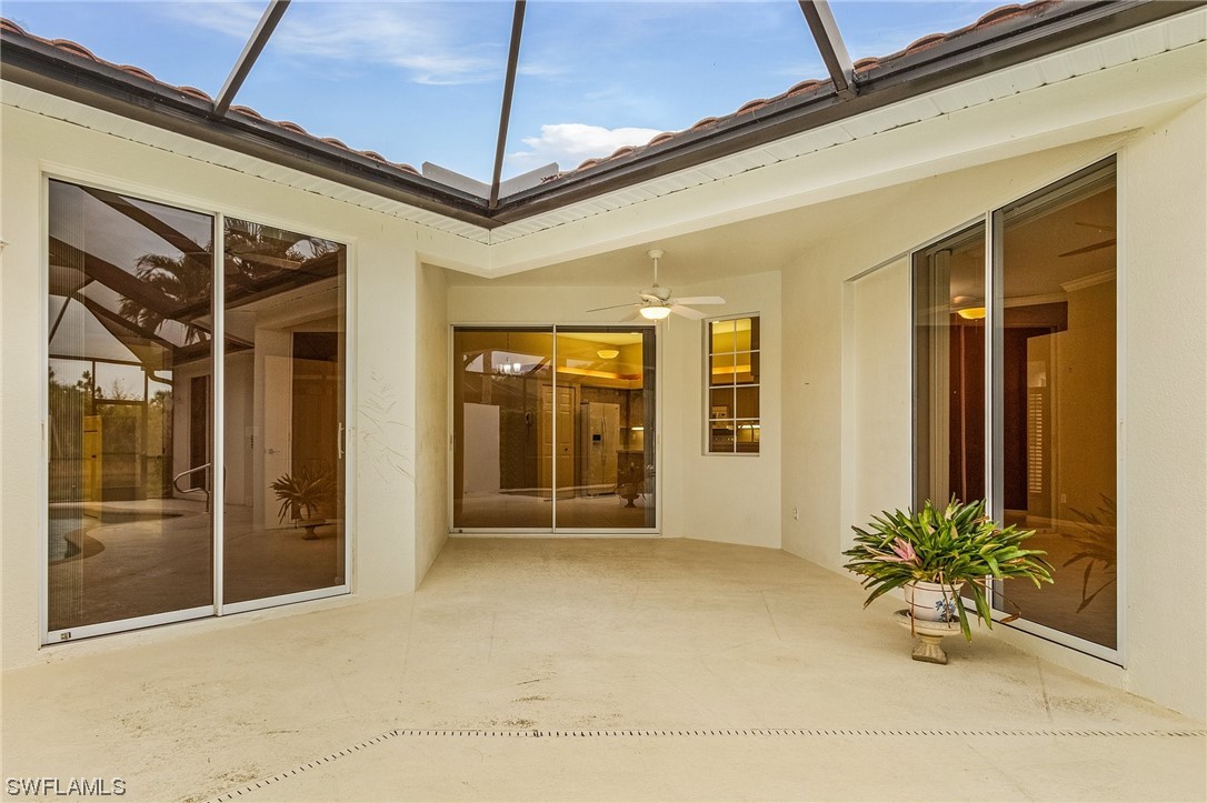 10321 Cape Roman Road, Unit 102 Estero, FL 34135 - Photo 6 of 33 a view of a entryway door front of house