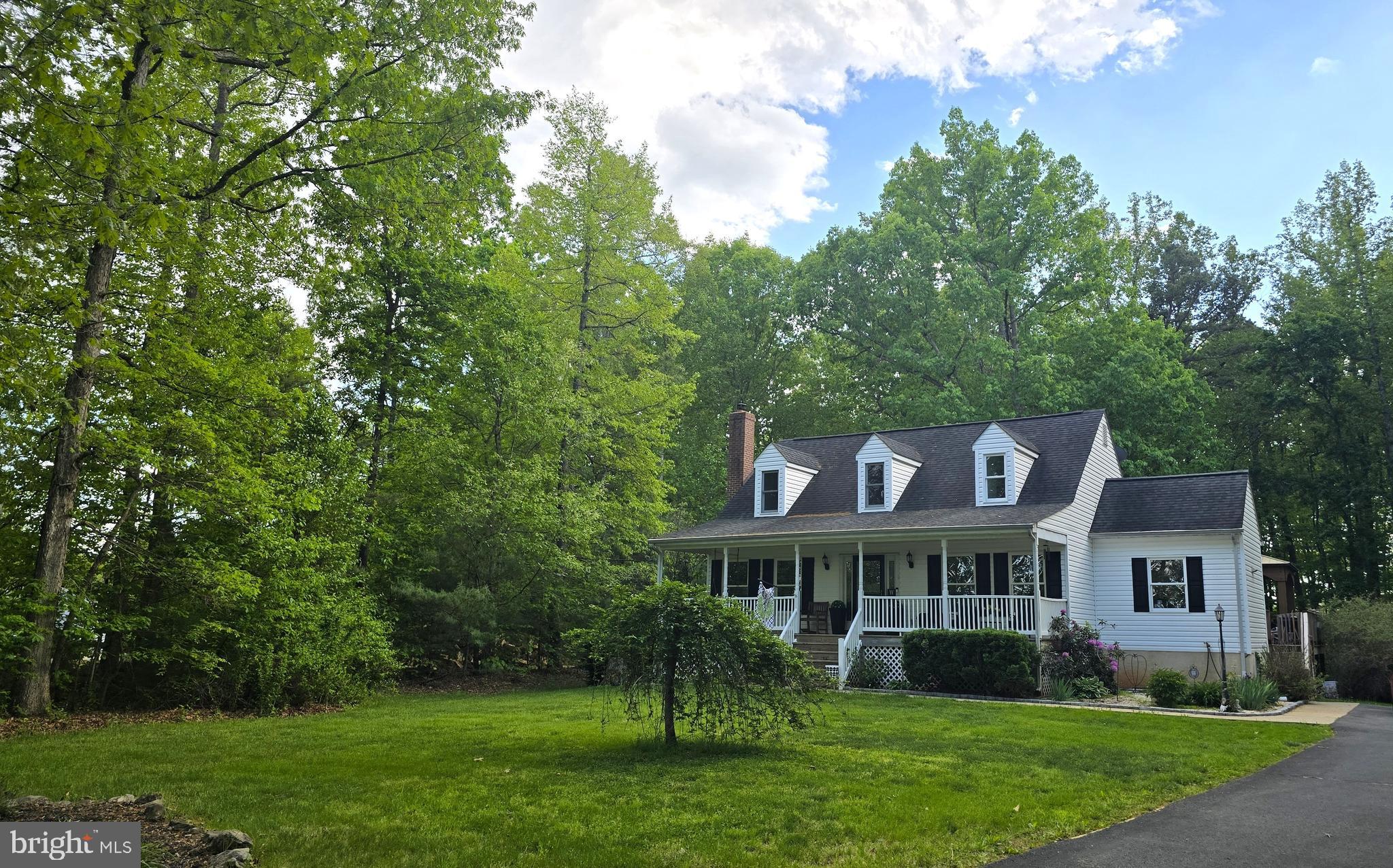17155 Hudson Mill Road Culpeper, VA 22701 - Photo 1 of 39 a view of a big house with a big yard and large trees