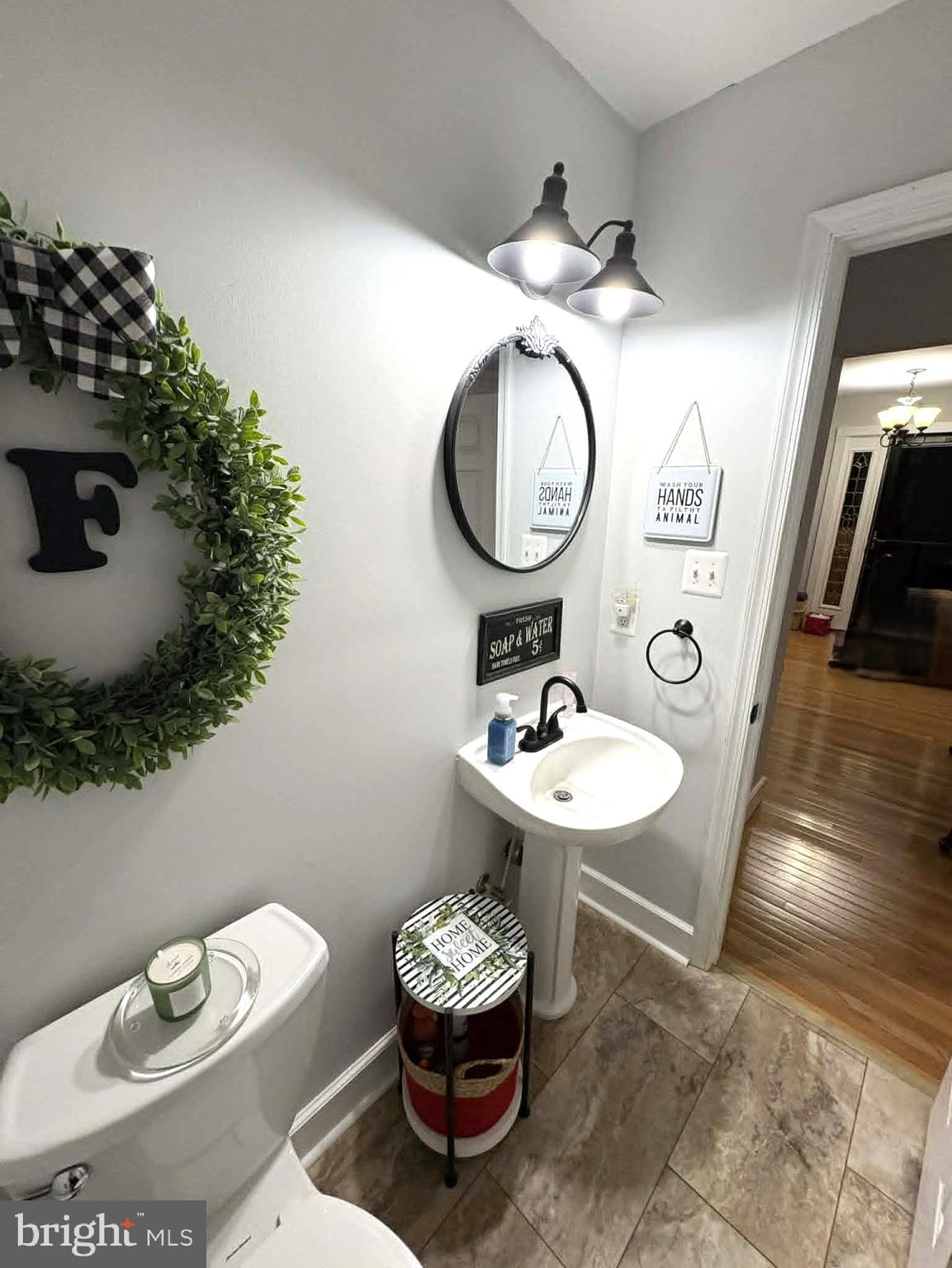 17155 Hudson Mill Road Culpeper, VA 22701 - Photo 16 of 39 a bathroom with a toilet sink and mirror