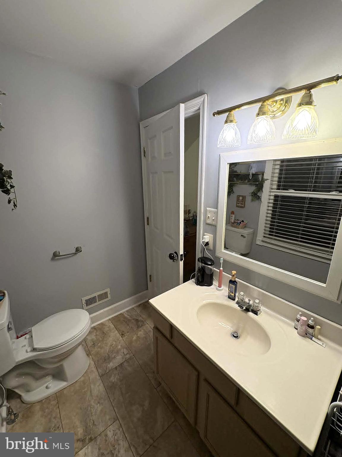 17155 Hudson Mill Road Culpeper, VA 22701 - Photo 27 of 39 a bathroom with a sink toilet and shower