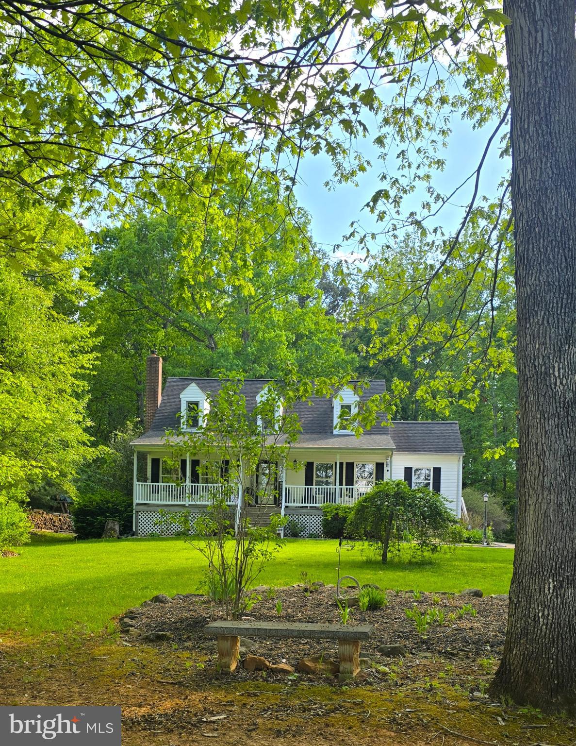 17155 Hudson Mill Road Culpeper, VA 22701 - Photo 3 of 39 a view of a big house with a big yard and large trees