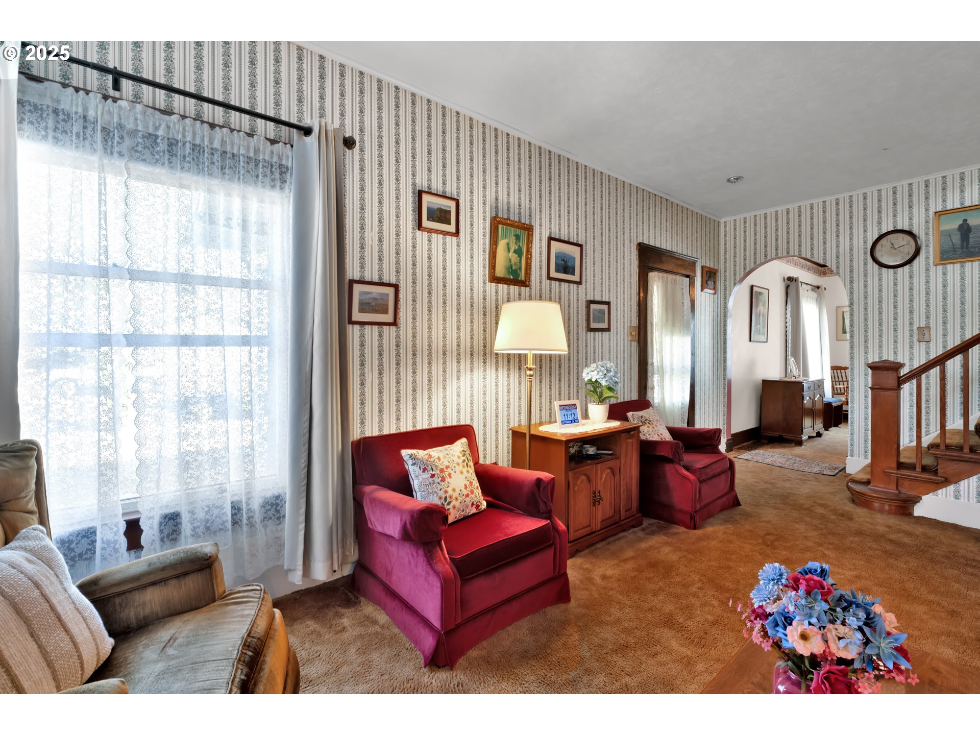 834 Southwest 9th Avenue Albany, OR 97321 - Photo 14 of 48 a living room with furniture a rug and a chandelier