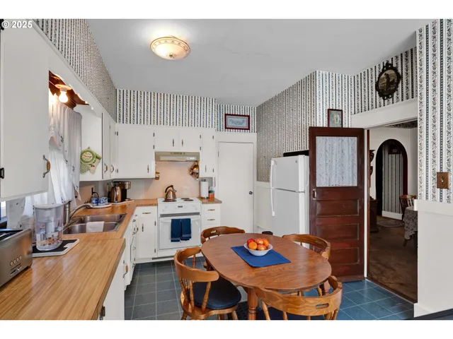 a workspace with furniture and window