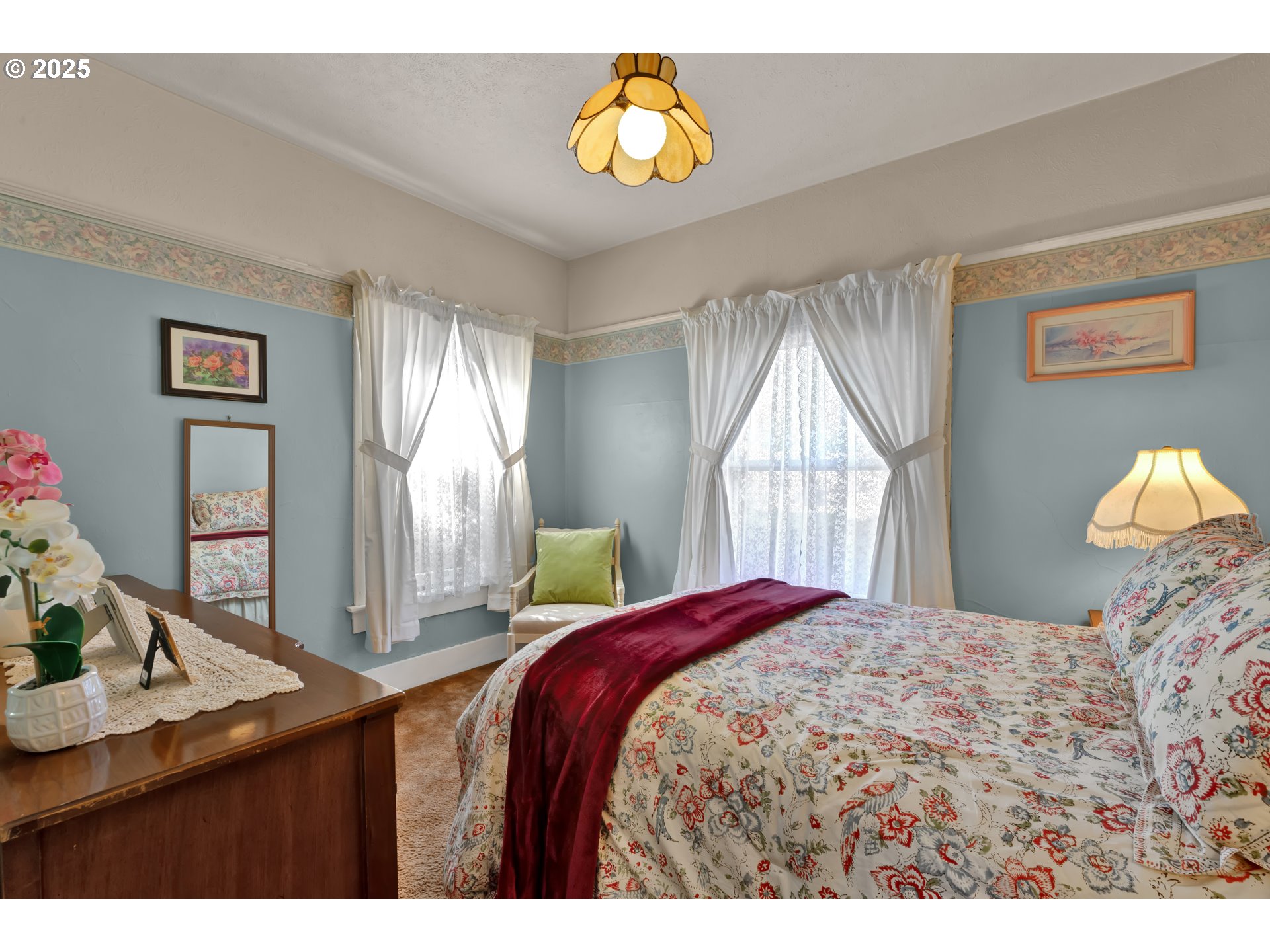 834 Southwest 9th Avenue Albany, OR 97321 - Photo 27 of 48 a bedroom with a bed and wooden floor