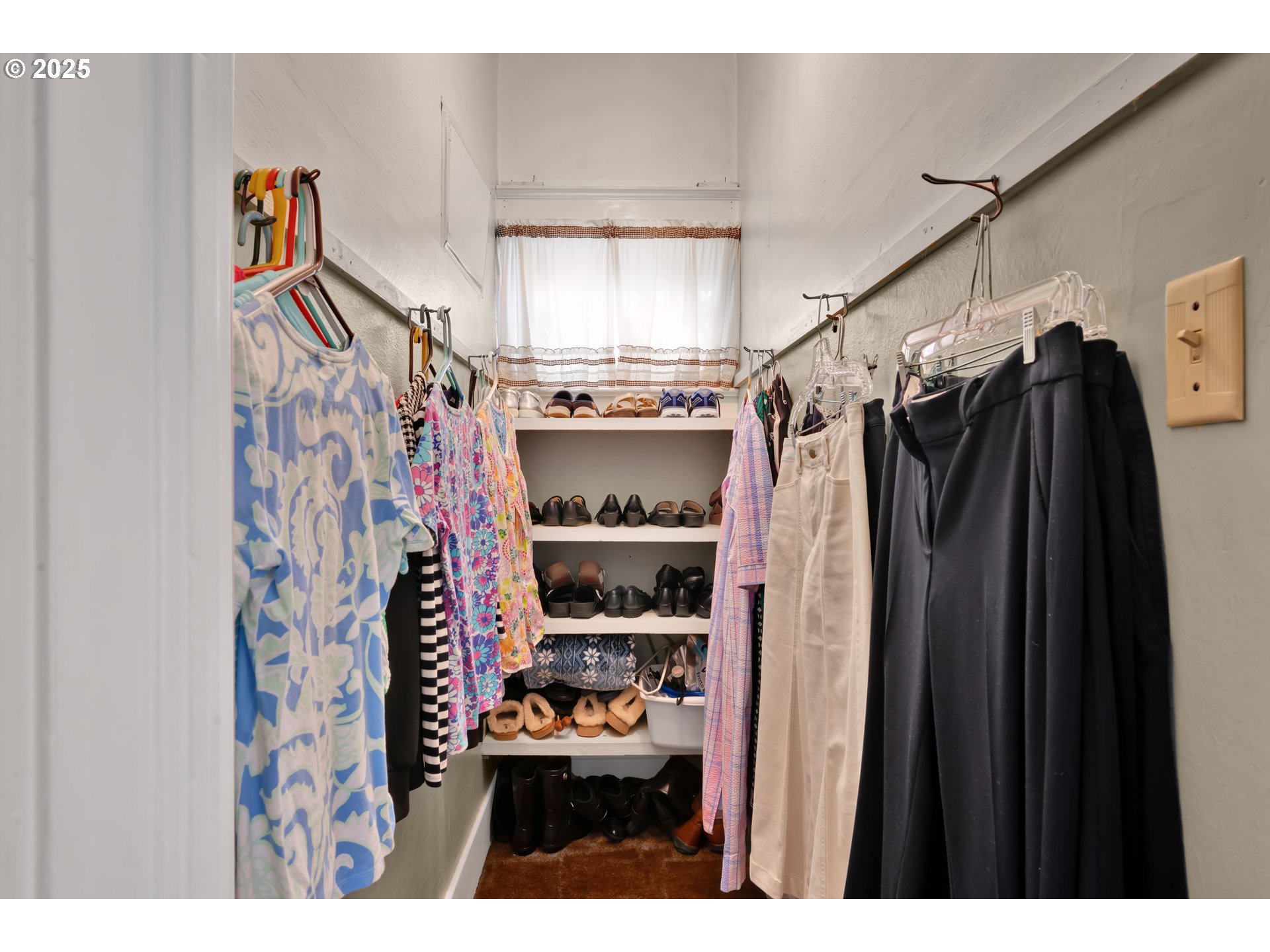 834 Southwest 9th Avenue Albany, OR 97321 - Photo 29 of 48 a view of walk in closet with clothes and shoes