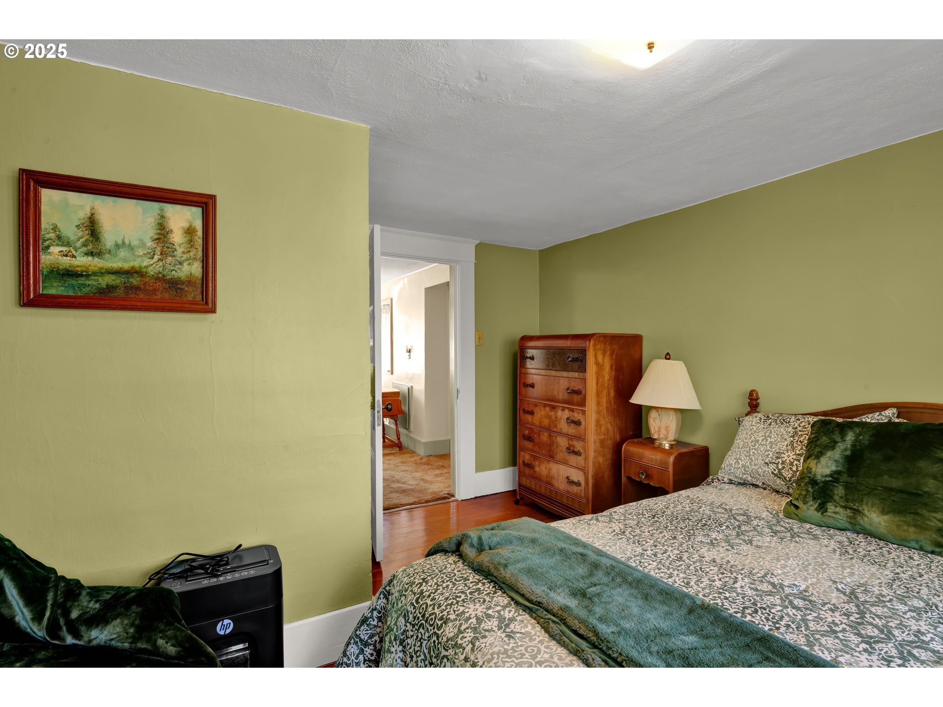 834 Southwest 9th Avenue Albany, OR 97321 - Photo 37 of 48 a bedroom with a bed and dresser