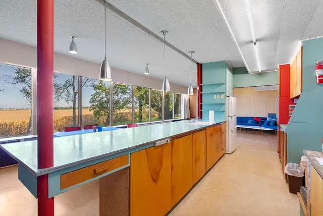 a view of a living room with a large window