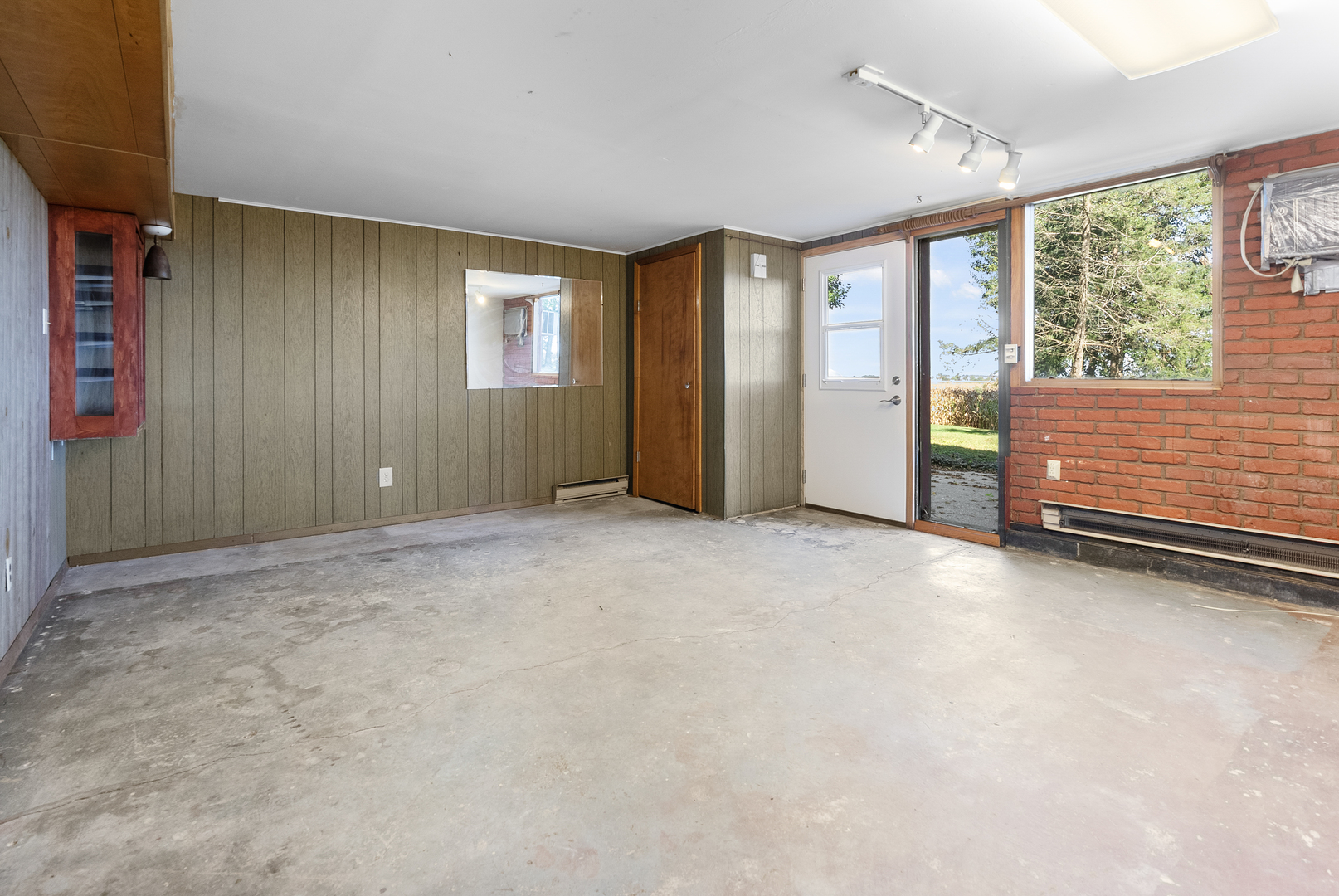 706 North 4th Street Ashton, IL 61006 - Photo 30 of 39 an empty room with large windows