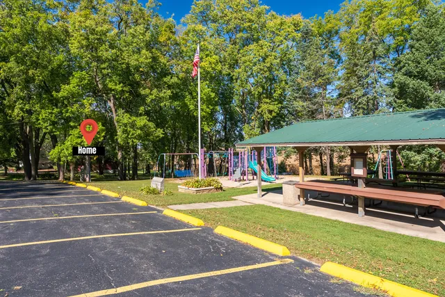 a view of a swimming pool with a patio
