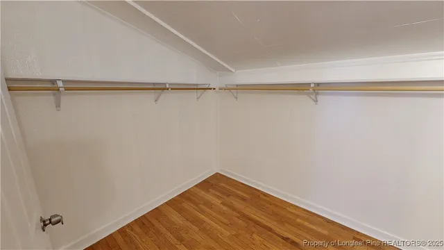 a view of a room with racks on the wall