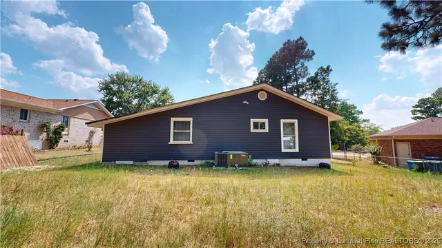 a house view with a garden space