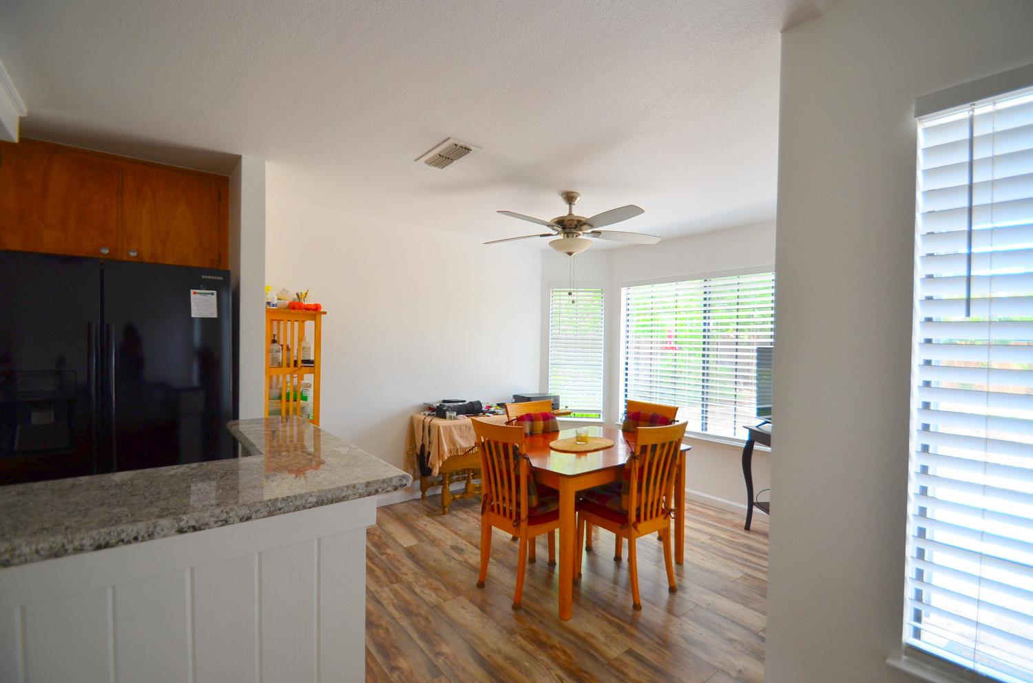 243 Rio Mesa Court Galt, CA 95632 - Photo 17 of 47 Breakfast area looks out to backyard, ceiling fans throughout