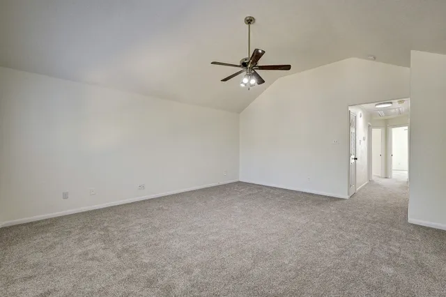 a view of a big room with carpet
