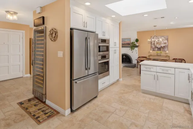 a living room with furniture window and a flat screen tv