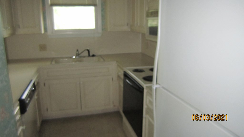 2250 15th Street, Unit 8 Columbus, GA 31906 - Photo 5 of 14 a utility room with dryer and washer