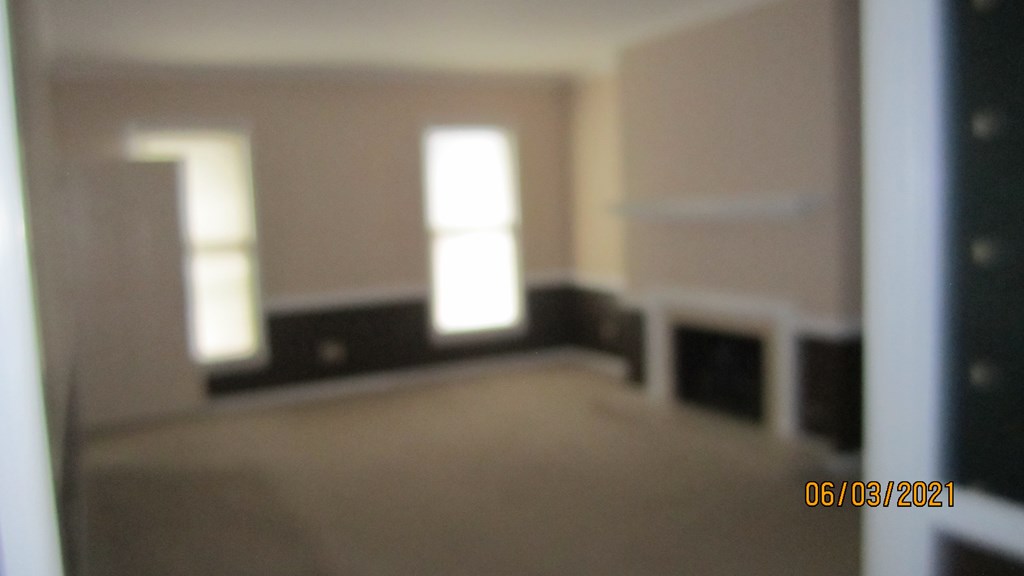 2250 15th Street, Unit 8 Columbus, GA 31906 - Photo 6 of 14 a view of empty room with window