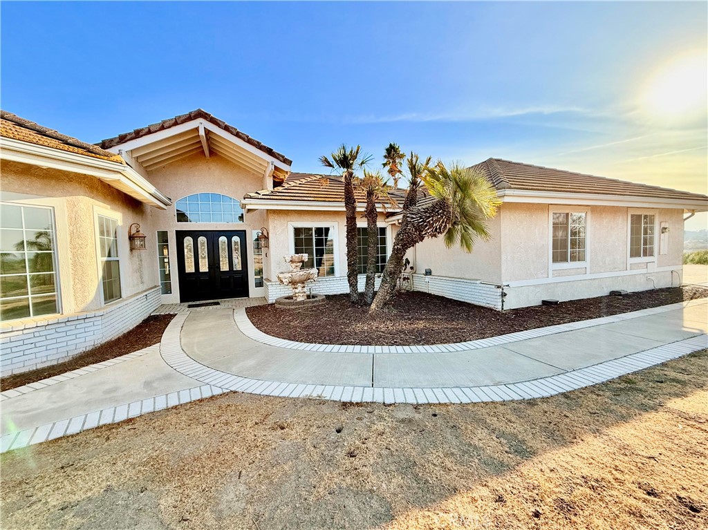 38022 Pauba Road Temecula, CA 92592 - Photo 1 of 1 a front view of a house with entertaining space