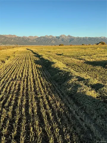 a view of an ocean and a mountain