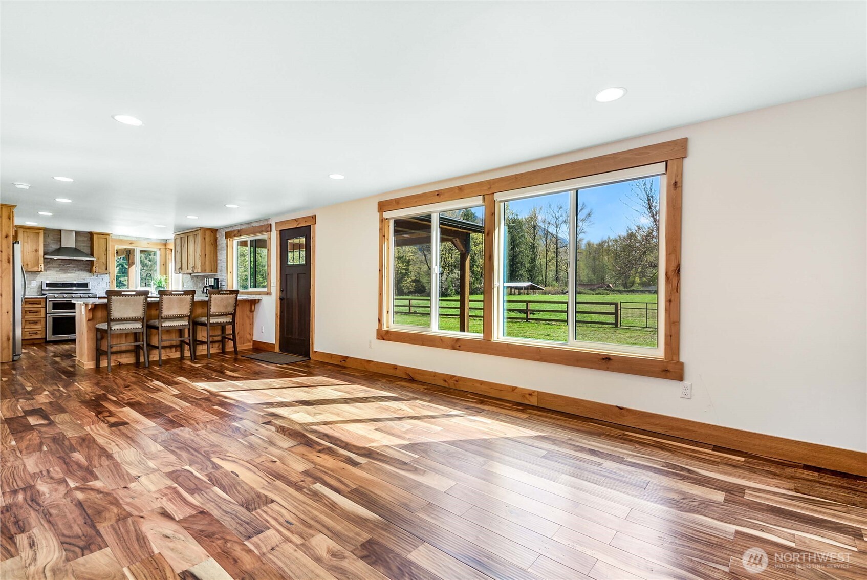 30313 State Rte 530 Northeast Arlington, WA 98223 - Photo 4 of 35 a view of work space with wooden floor and windows