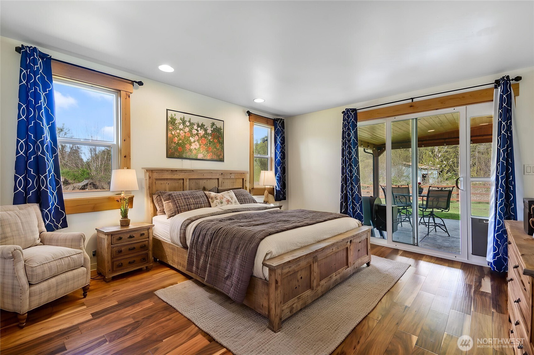 30313 State Rte 530 Northeast Arlington, WA 98223 - Photo 8 of 35 a bedroom with a bed and a large window