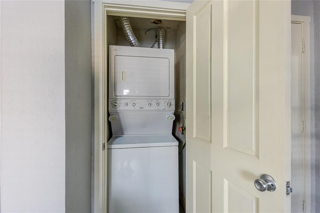 3005 Upcreek Alley, Unit 4 Strawn, TX 76475 - Photo 13 of 29 a utility room with dryer and washer