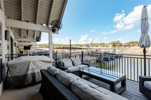 a view of a roof deck with couches
